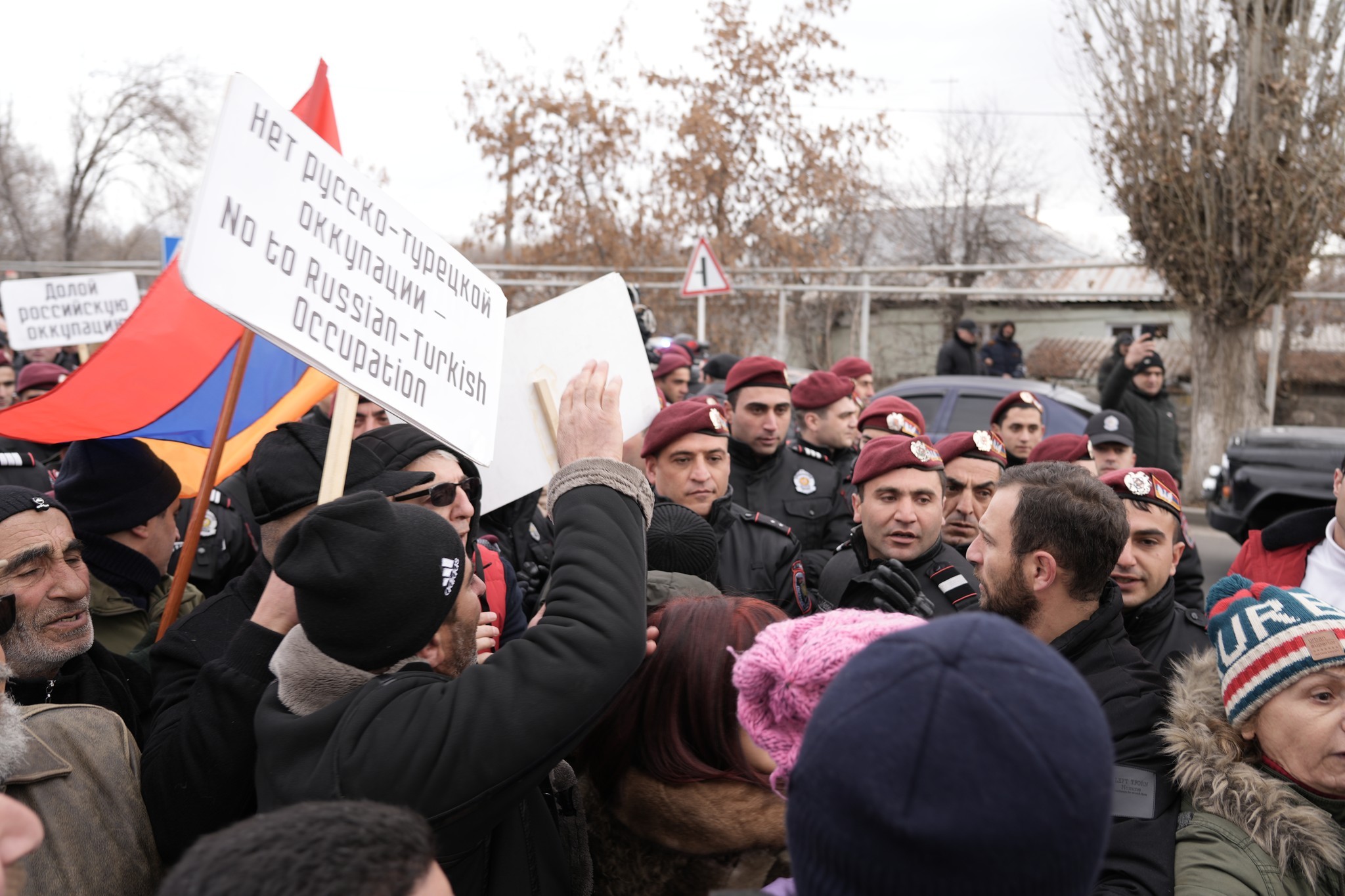 Police officers confront the anti-Russia march in Gyumri. Photo: National Democratic Pole Party.