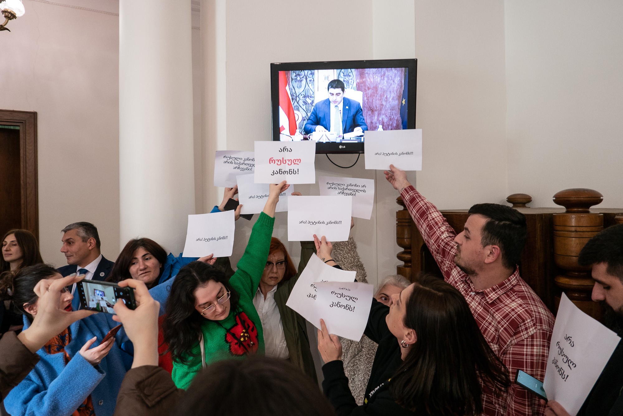 Journalists demonstrate in parliament on 27 February against the draft law. Photo: Mariam Nikuradze/OC Media.