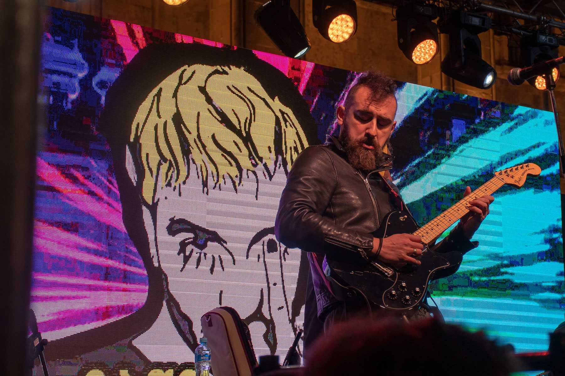 Georgian artists played on the background of a stylised image of the 21-year-old Lazare Grigoriadis. Photo: Shota Kincha/OC Media.