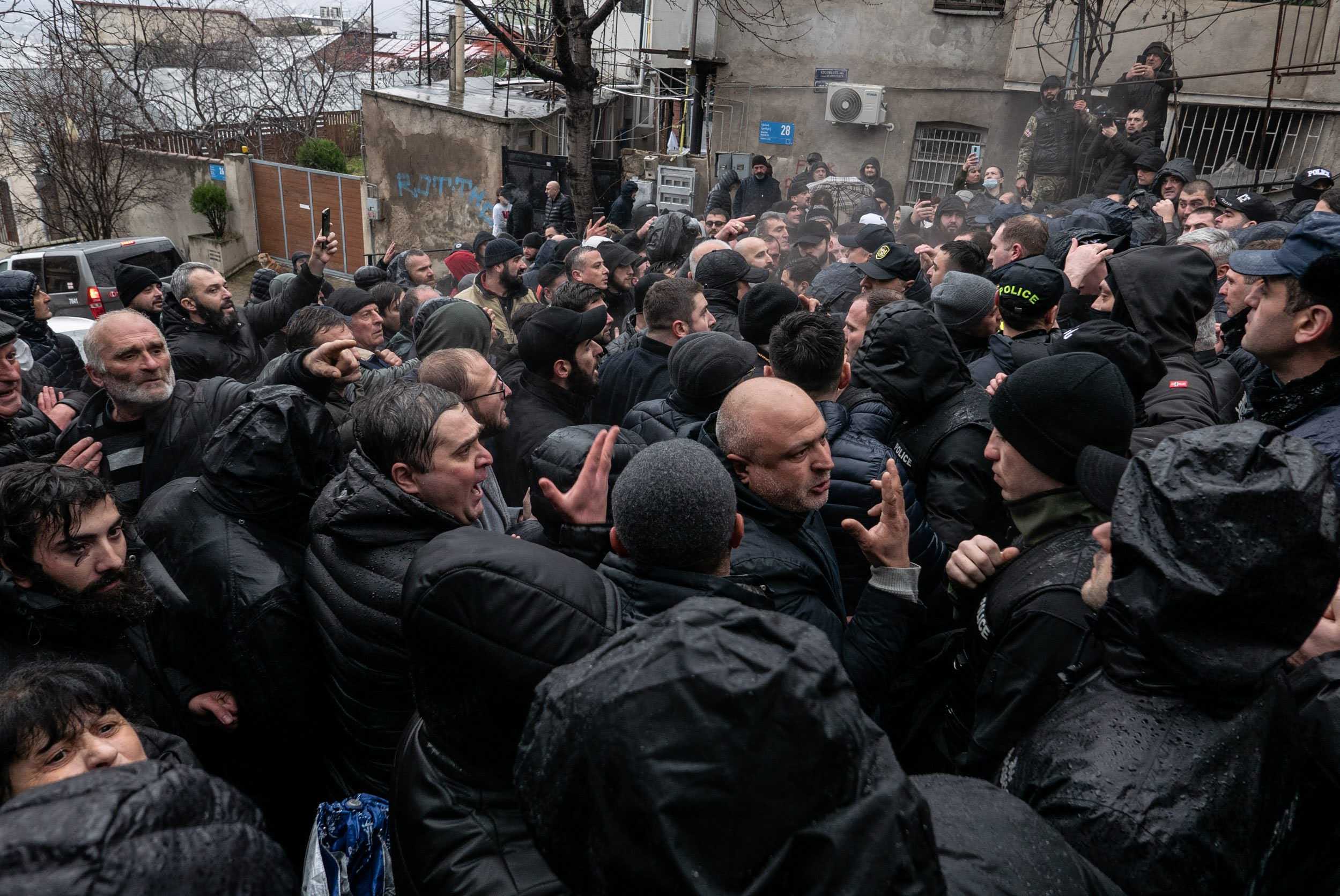 Far-right protesters gathered outside the house of activist Nata Peradze on 10 January 2024. Photo: Mariam Nikuradze/OC Media.