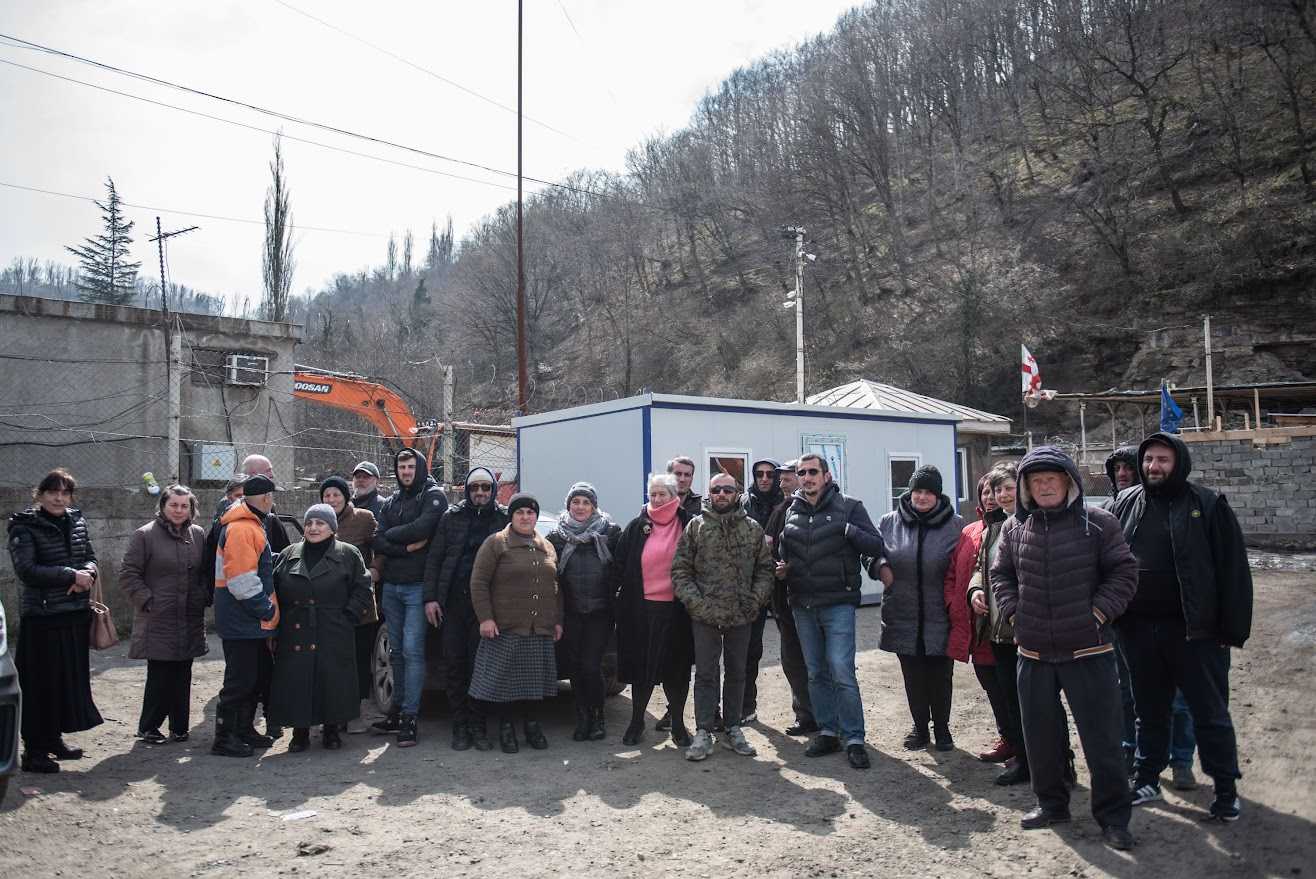 Residents of Shukruti in western Georgia in front of a mine in their village. Mariam Nikuradze/OC Media.