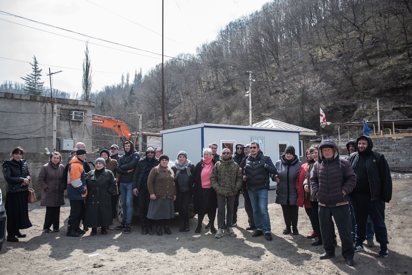 Residents of Shukruti in western Georgia in front of a mine in their village. Mariam Nikuradze/OC Media.