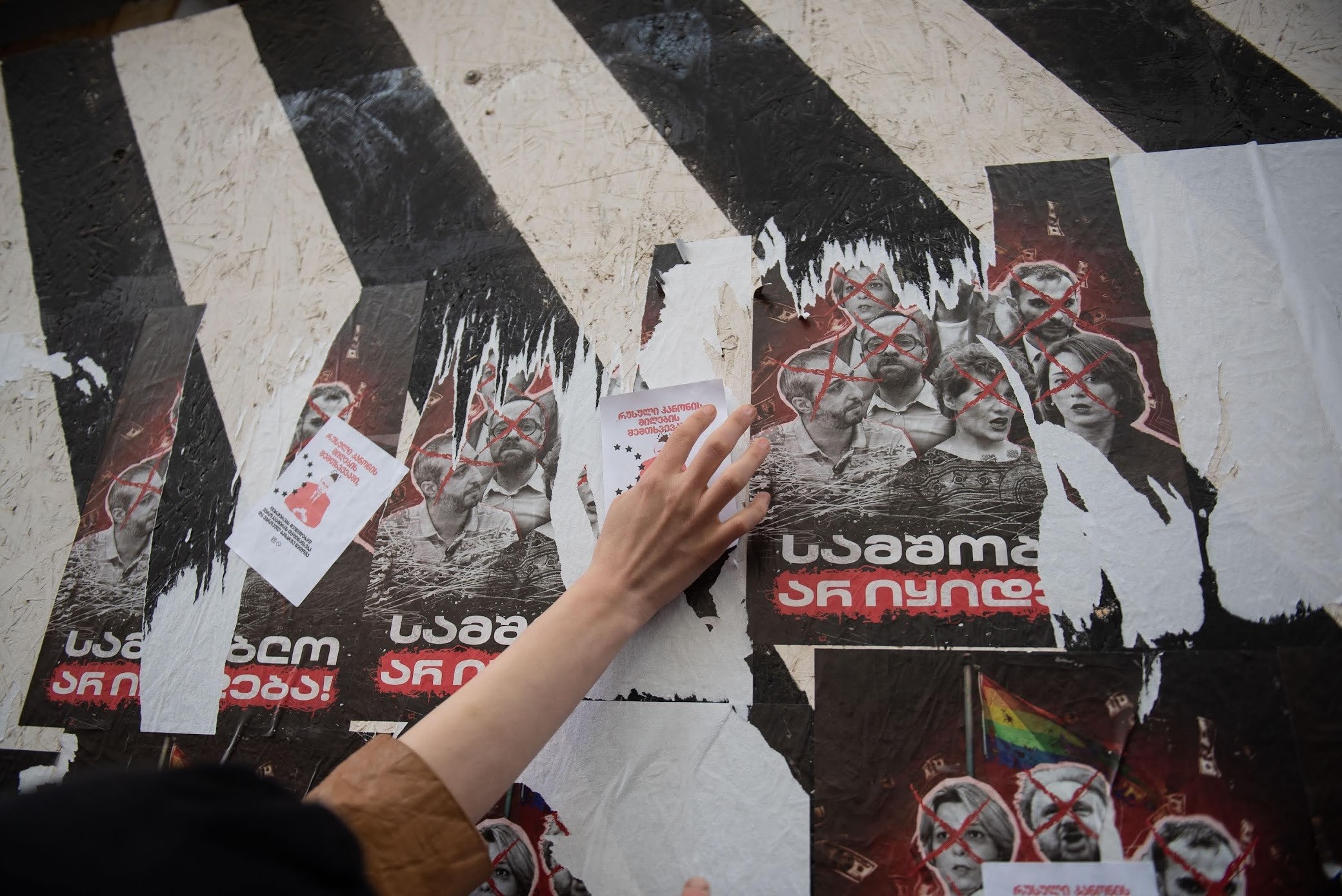 After Georgian Dream announced they were bringing back the foreign agent law on 3 April, posters targeting civil society and media figures appeared throughout Tbilisi. Mariam Nikuradze/OC Media.