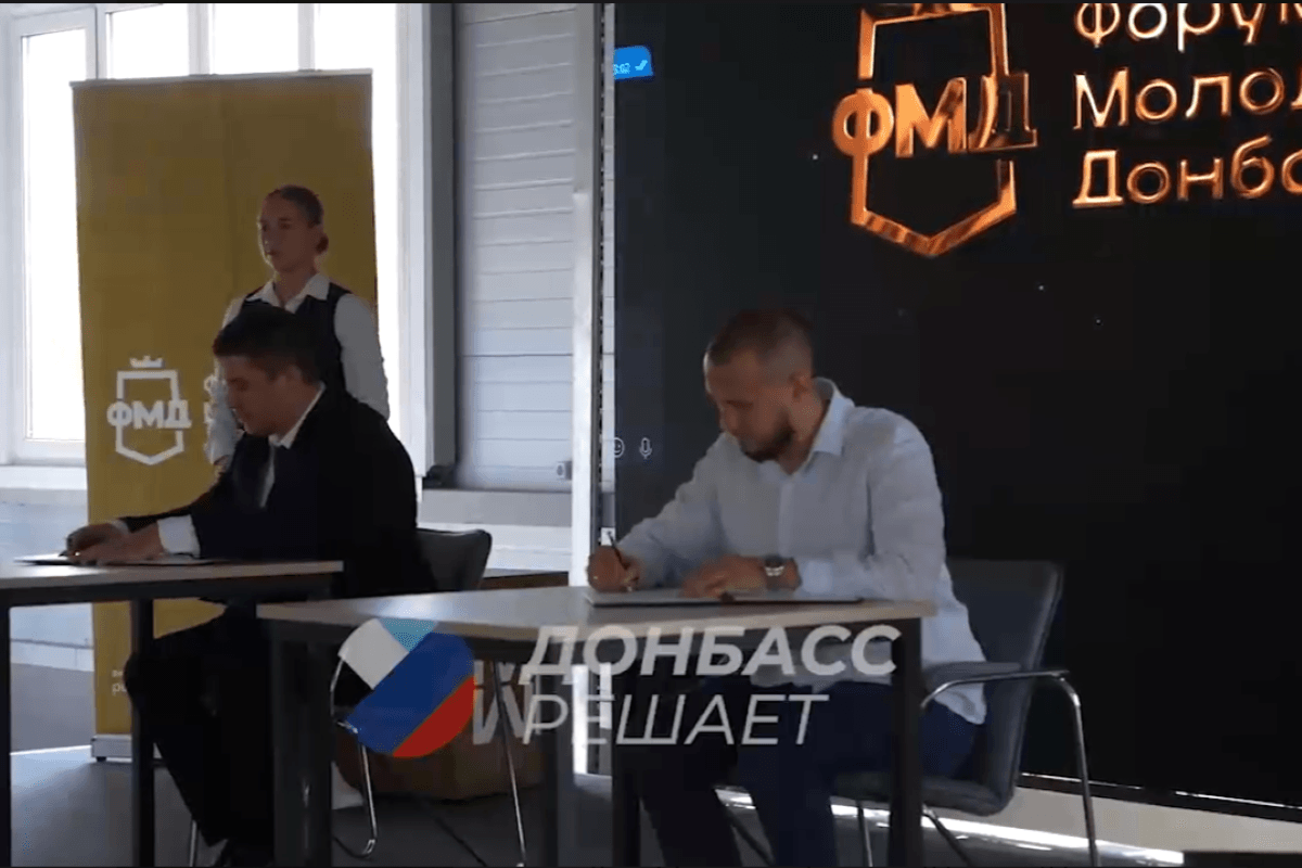 South Ossetia’s Committee on Youth Policy and Sports deputy chair Andrei Ottaev and Russian-occupied Donetsk’s Donetsk’s Youth Policy Minister Kiril Makarov. Screengrab via Telegram.