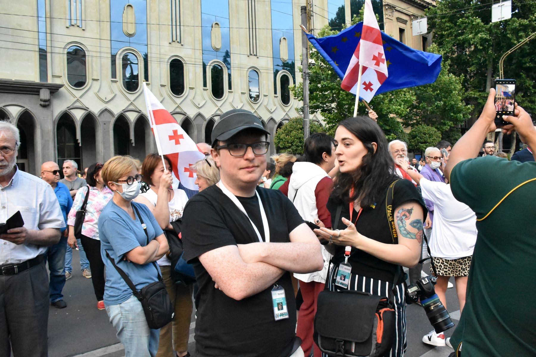 OC Media editor-in-chief Robin Fabbro and executive director Mariam Nikuradze covering a pro-EU rally in Tbilisi in June 2022. Photo: Tata Shoshiashvili/OC Media.