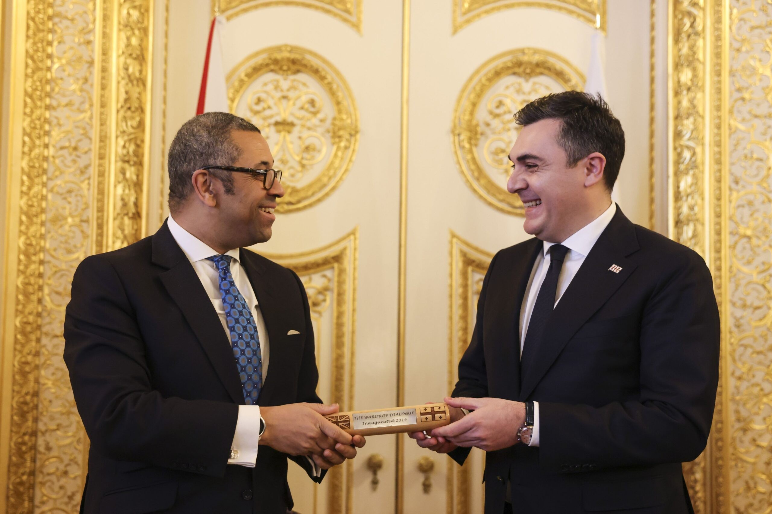British Foreign Secretary James Cleverly and Georgian Foreign Minister Ilia Darchiashvili with the Wardrop Baton during the eighth round of the dialogue at Lancaster House in 2023. Official image.