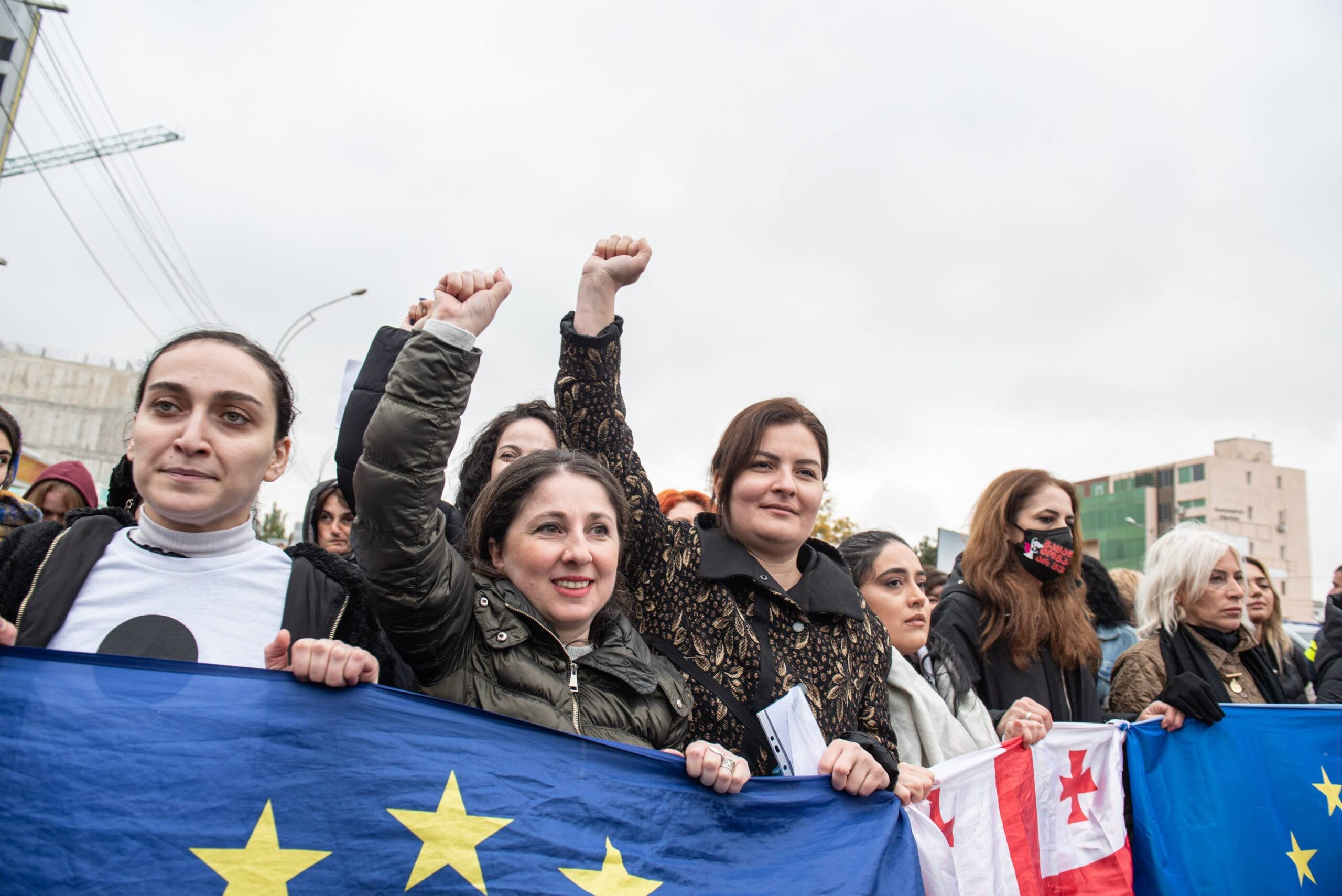 Teona Chalidze from Unity - National Movement (centre-left) and Ana Natsvlishvili (centre-right) from the Strong Georgia group leading the women’s march on 13 November in Tbilisi. Image: Mariam Nikuradze/OC Media.