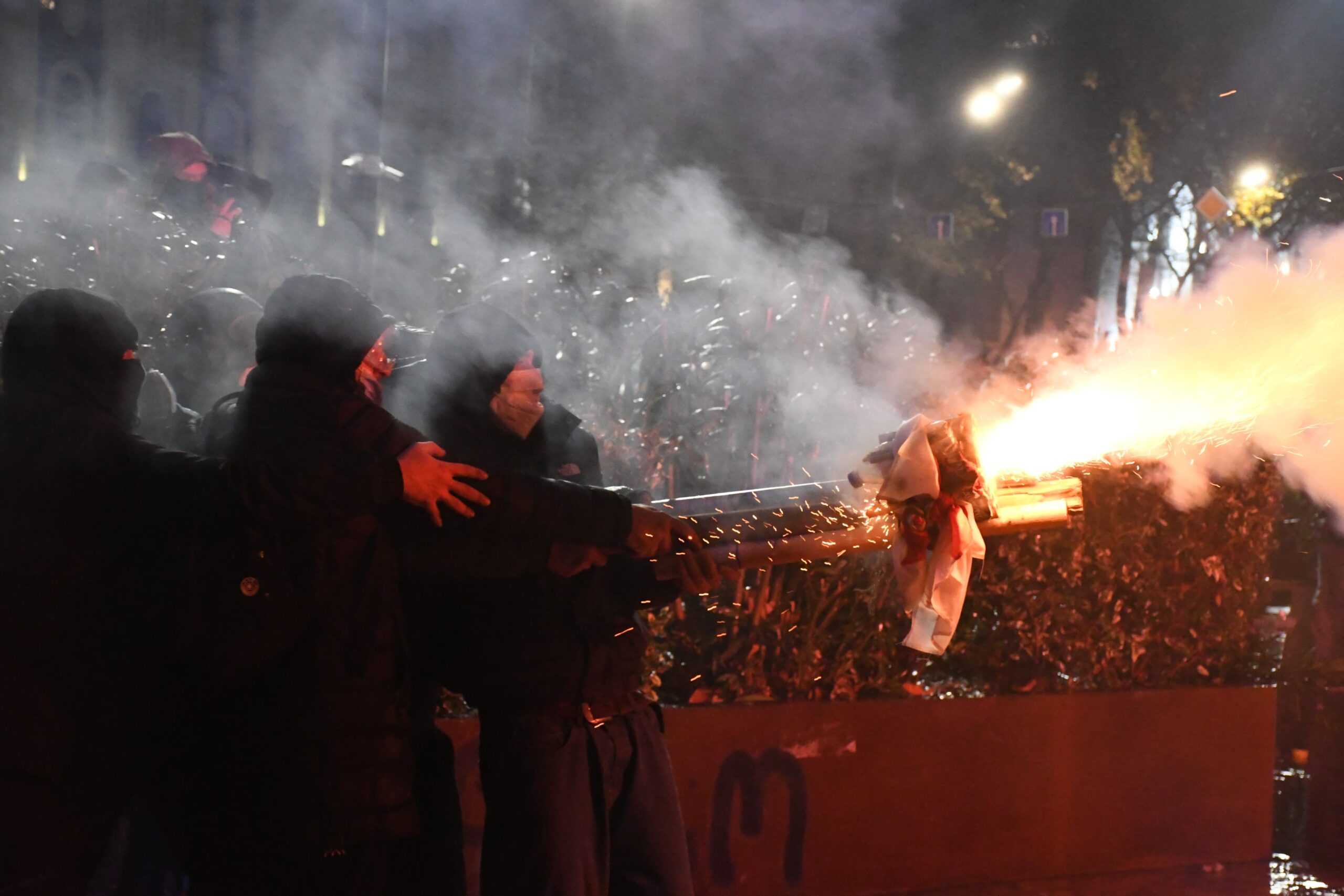 Protesters shoot fireworks at police amid a demonstration in Tbilisi on 1 December. Photo via Mariam Nikuradze/OC Media
