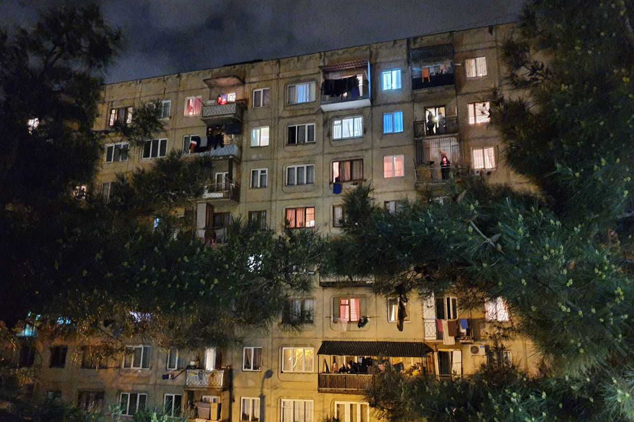 Many who didn’t attend church services lit candles on their balconies. Photo: Dato Parulava/OC Media.